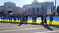 Жители Херсона протестуют против российской оккупации. Март 2022 года. Фото: Reuters