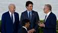 Yhdysvaltain presidentti Joe Biden (vas.) Kanadan pääministeri Justin Trudeau, Australian pääministeri Anthony Albanese ja Britannian pääministeri Rishi Sunak (alhaalla edessä) Hiroshimassa 20. toukokuuta. 