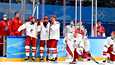 Venäjän olympiakomitean joukkue pelasi Pekingin olympialaisissa. Pelaajat olivat pettyneitä Suomelle koetun finaalitappion jälkeen.