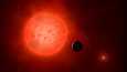 Taiteiljan näkemys planeetasta kiertämässä punaista kääpiötähteä. Sellainen on esimerkiksi Auringon lähin naapuri Proxima Centauri, jolla on havaittu kaksi kiertolaista.