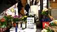 Ison Omenan kauppakeskukseen on tuotu kynttilöitä ja kukkia kuolleen naisen muistoksi.