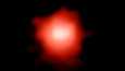 Tämä punertava valo on lähtenyt matkaan arviolta 13,5 miljardia vuotta sitten. 