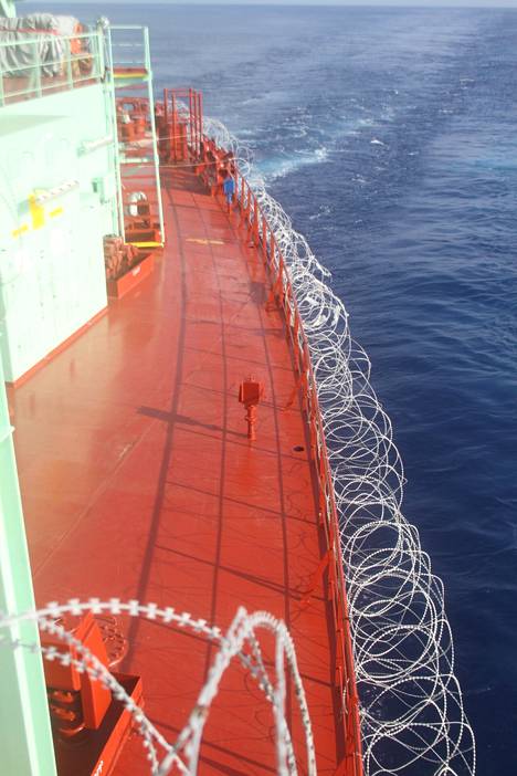 Barbed wire barriers were pulled on the deck of the ship in case of pirates.