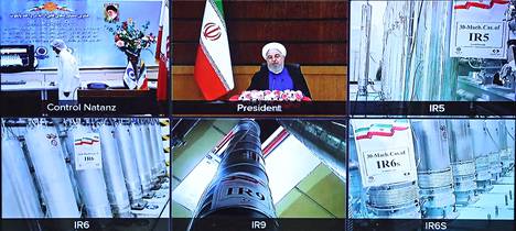 Iranin presidentinhallinnon välittämä kuva huhtikuulta, jossa näkyy paitsi presidentti Hassan Ruhani, myös useita uraanin rikastamiseen käytettäviä sentrifugeja.