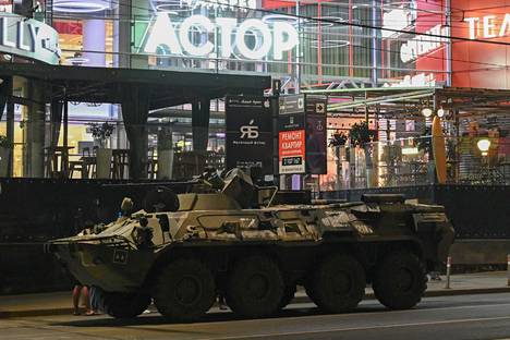 An armored vehicle in the early hours of Saturday next to a shopping center in Rostov-on-Don.