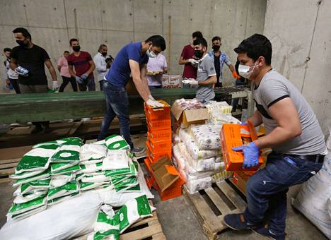Libanonin pääkaupungissa Beirutissa jaettiin ruoka-apua toukokuussa 2020. 