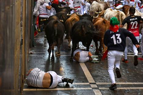 Some of the runners fell and were trampled by bulls.