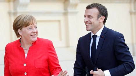 Merkel ja Macron pohjustivat Berliinissä euroalueen uudistamista, mutta edessä on vielä suuri vääntö – kaksikko hioo yhteistä viestiä Donald Trumpille