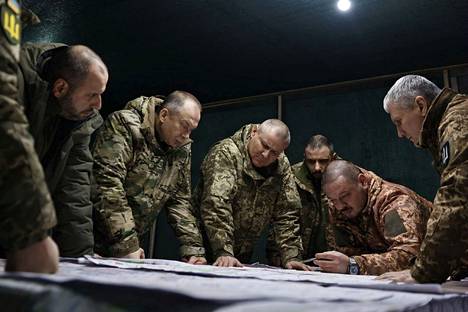 Ukrainian Armed Forces Commander Oleksandr Syrskyi (2nd left) and Defense Minister Rustem Umerov (left) met with the military leadership on the front line in eastern Ukraine on Wednesday.
