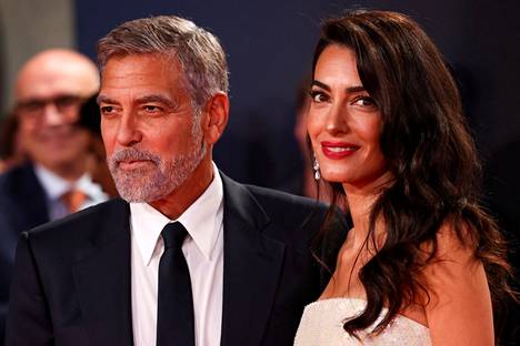 Näyttelijä George Clooney ja ihmisoikeusjuristi Amal Clooney.