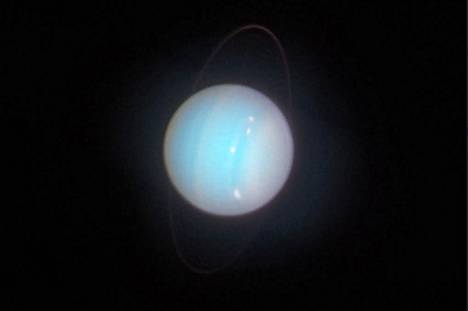 Uranus vuonna 2014: Avaruusteleskooppi Hubble kuvasi Uranusta 2014. Kylmän ja kaasuisen planeetan pinnalla erottui silloin vaaleita pilvimuodostelmia. 