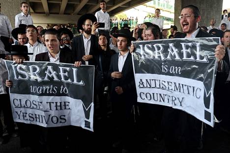 Ultra-Orthodox protested the court's military service decision last Thursday by blocking a road in the city of Bnei Brak, Israel.  Protesters accused the decision of being anti-Semitic.