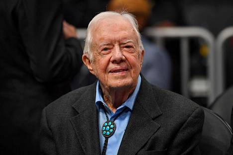 Jimmy Carter, 95, kuvattiin Atlanta Hawksin ja New York Knicksin välisessä koripallo-ottelussa Atlantassa helmikuussa.
