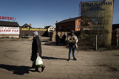 The troop checkpoint is located in an old industrial area on the outskirts of Kiev.  According to photographer Niklas Meltion, there are several such points around the city.