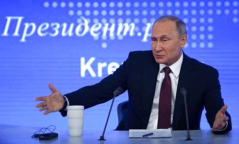 Venäjän presidentti Vladimir Putin pitämässä suoraa lehdistötilaisuuttaan perjantaina.