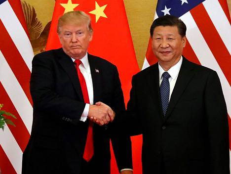 Presidentit Donald Trump ja Xi Jinping Pekingissä torstaina.