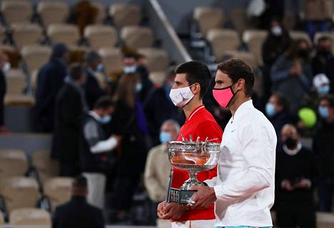 Rafael Nadal (R) defeated Novak Djokovic in the 2020 French Open final.