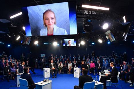 Exceptionally, both of Putin's daughters were seen at the economic forum.  Putin's second daughter, Katerina Tihova, appeared at the economic forum via remote connection.