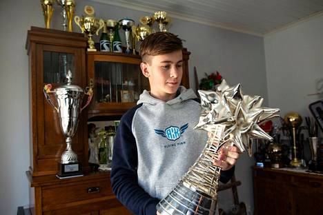 Tuukka Taponen's prize cabinet was already bulging a year ago, when IS visited the Taponen family's home.  There has been a lot of extra stuff on the shelf this year.