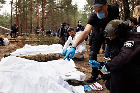 At least the numbers of the graves were marked on the body bags.