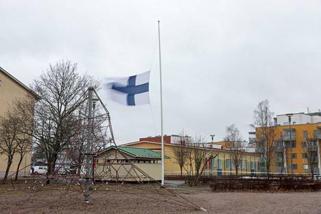 The flag was at half-mast in the school courtyard.