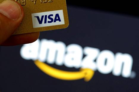 Visa-luottokortti ja Amazon-verkkokaupan logo.