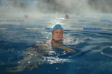 Svetlana Sinitsyna, who retired from the work of an accountant, has been a regular customer of the outdoor swimming pool for a decade.