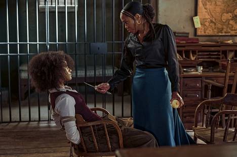 Women play a key role in the series.  Mary Fields (Zazie Beetz, left) and Trudy Smith (Regina King) use the weapon, plot and kill if necessary.