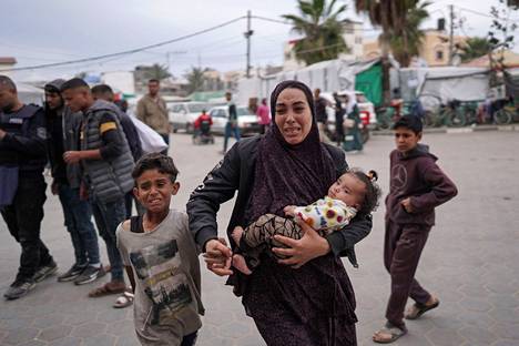 The family was brought to the hospital after Israel struck the Bureij refugee camp in Keksi-Gaza.