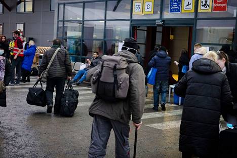 Turvapaikanhakjioita Tegelin entisen lentokentän väliaikaisessa vastaanottokeskuksessa joulukuussa Berliinissä.