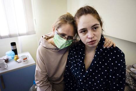 Eugenia (right) with her mother Lena at the children's hospital.