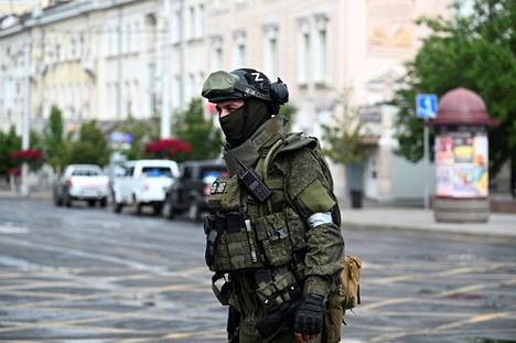 A Wagner soldier standing guard on a street in Rostov-on-Don on Saturday.