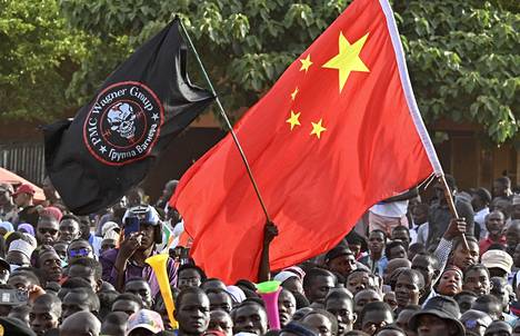 The flags of Wagner and China flew at a protest last September, when French troops were demanded to withdraw from Niger.