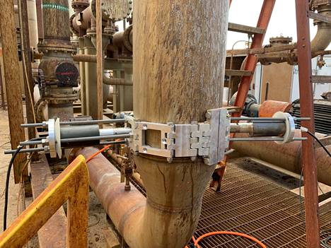 Altum Technologies' ultrasonic transducers mounted on an industrial pipe.  The photo was taken from a US customer's facility.
