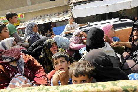 Syyrialaispakolaisia saapui rajan yli Labwehin kylään Libanoniin elokuun alussa.  