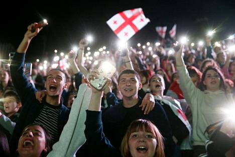 Mobile phone flashlights brought atmosphere to Tbilisi's historic evening.