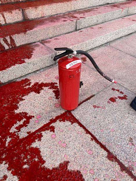 The protesters scored on the empty fire extinguishers themselves.