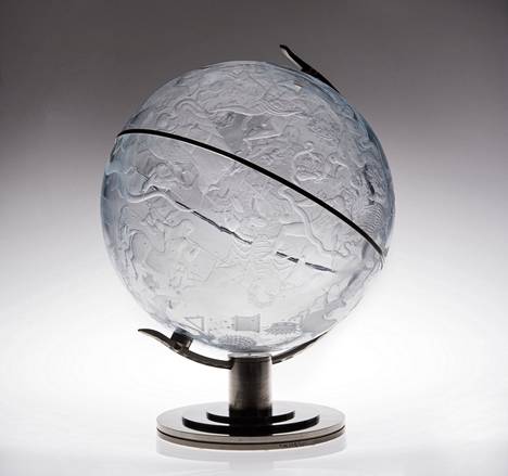 Edward Haldin's Himmelsglob (1929–1930), crystal engraving, pewter stand.  Orrefors glass factory production.
