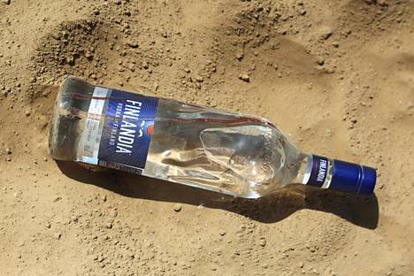   A bloody bottle of Finlandia vodka was found next to the car. 