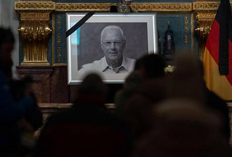 Munich residents lined up to write their names in Franz Beckenbauer's memorial book.