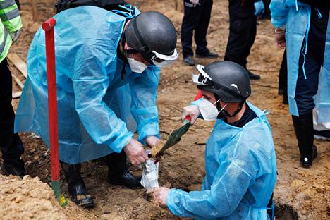 The bodies were measured and a soil sample was taken from each grave.