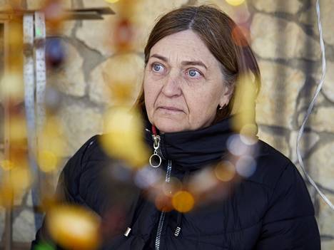 Ona Žebrauskienė on myynyt matkamuistoja Ristikukkulalla 25 vuoden ajan. Hän on valmistautunut pakenemaan maasta, jos sota laajenee Liettuaan.