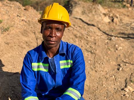 Petiner Makupa is trained to use power tools.  Although the mining work is physically heavy, Makupa says he will be used to it in a few weeks.