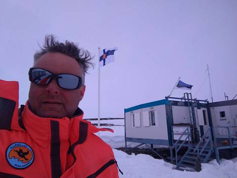 The head of Finland's Antarctic operations, Mika Kalakoski, has been involved in organizing research trips to Antarctica since 1999. In the background, the Finnish research station Aboa.