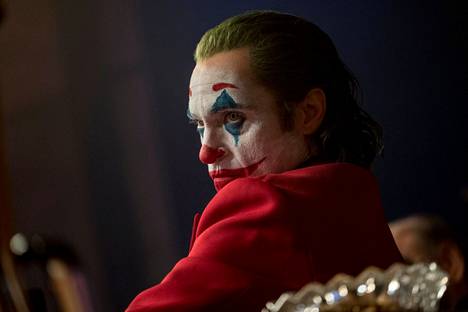 Joaquin Phoenix makes a splash in the Joker movie as a man whose mask becomes a symbol of the despair of the underprivileged.