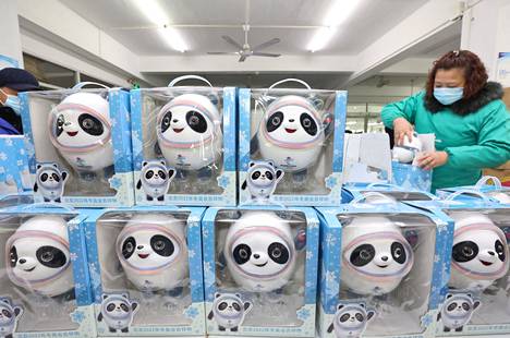 Workers rushed immediately after the vacations to make more mascots in Qidong City, Jiangsu Province.