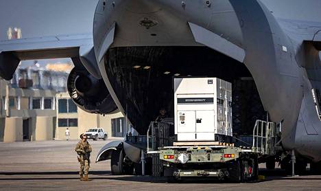 A US soldier oversees the arrival of a shipment of aid at the airport in the Haitian capital on May 22.  The United States does not promise a more permanent presence of soldiers.