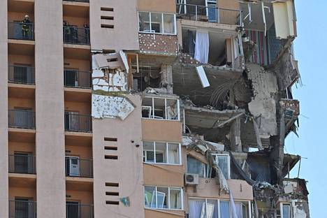 Destruction of a missile strike in a Kiev apartment building on Saturday.