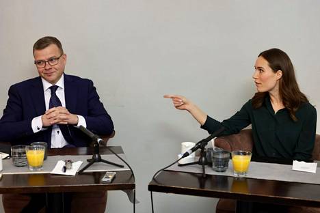 Kokoomuksen puheenjohtaja Petteri Orpo ja Sdp:n puheenjohtaja, pääministeri Sanna Marin ottivat yhteen politiikan toimittajien väittelytilaisuudessa Helsingissä viime viikon perjantaina.