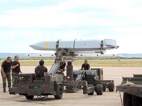 US Air Force soldiers loading a Jassm missile onto a bomber in Texas in 2005.